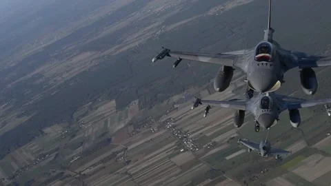 Air To Air View Of Two Polish F 16's Fly | Stock Video | Pond5