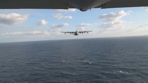Air to air view of two U.S.A.F. MC-130J Commando II in-flight over Pacific  Stock Footage 229698709