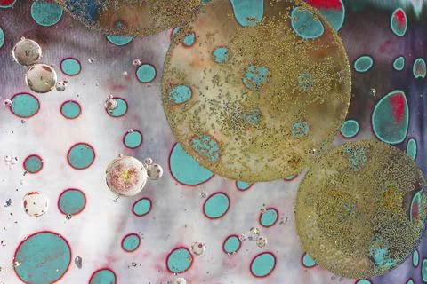 Air and oil bubbles inside water base form patterns Stock Illustration