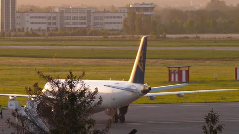 Air Astana Embraer E190-E2 on the apron at Almaty Airport, Kazakhstan Stock Footage 336037344