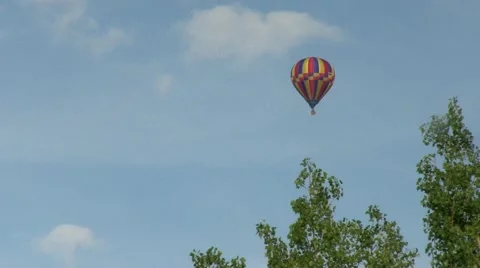 Air balloon behind trees 2 Stock Footage 40975582