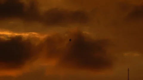 Air balloon falling alone in the sky Stock Footage 125055472