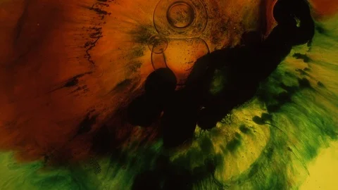 air bubble explode in a melting orange a... | Stock Video | Pond5