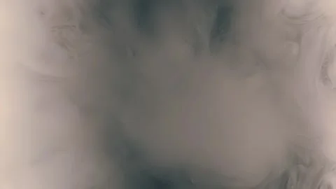 An air bubble filled with smoke explodes spectacularly, forming beautiful cloud Stock Footage 313145995