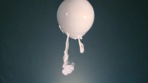 An air bubble filled with smoke explodes spectacularly, forming beautiful cloud Stock Footage 313152386