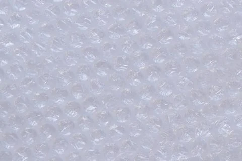 Air bubble wrap, top view. Transparent bubble wrap on light background Foto stock