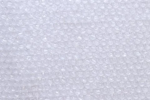 Air bubble wrap, top view. Transparent bubble wrap on light background Foto stock