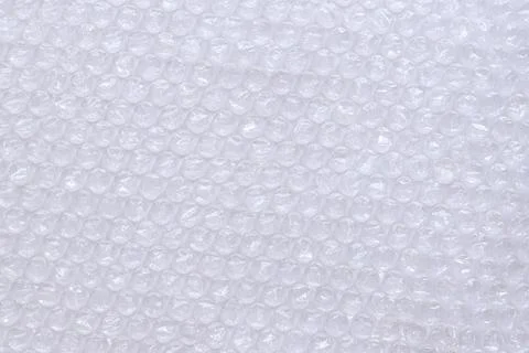 Air bubble wrap, top view. Transparent bubble wrap on light background Foto stock