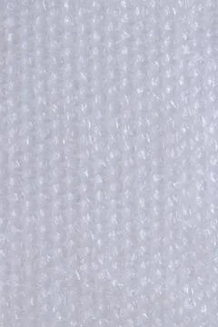 Air bubble wrap, top view. Transparent bubble wrap on light background Foto stock