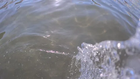 Air bubbles are moving underwater with soft bokeh lights and blurry white foam, Stock Footage 343081190