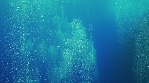 Air Bubbles in the Blue Water Stock Footage 254732044