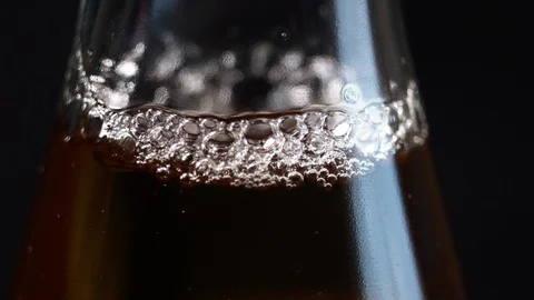 Air bubbles in a bottle with a drink Stock Footage 87302586