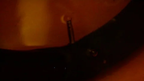 Air bubbles come out from punctured bicycle tire. Stock Footage 107882630