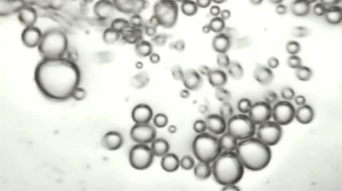 Air bubbles emerging from the water Stock Footage 12568456