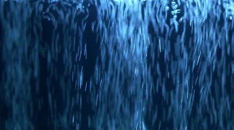 Air bubbles emerging from the water Stock Footage 12568607