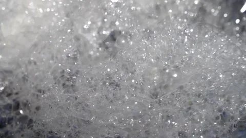 Air bubbles forming on a small river in forest. Stock Footage 240453481