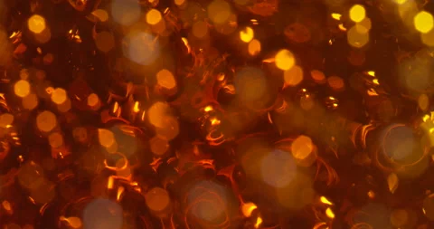 Air bubbles going up in a yellow liquid. Slow motion close up shot. Stock Footage 146602586
