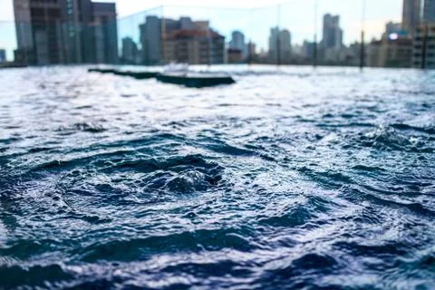 Air bubbles for hydrotherapy in pool on rooftop of condominium or hotel Foto stock