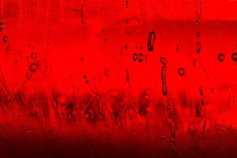 Air bubbles in red ice. Abstract background Stock Photos