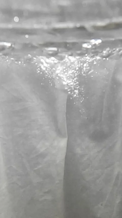 Air bubbles rising underwater creating abstract texture Stock Footage 321241603