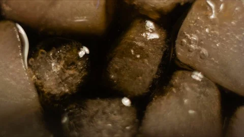 Air bubbles in the stake between ice cubes Stock Footage 75811823