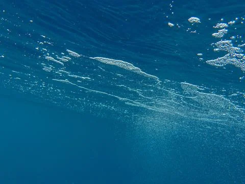 Air bubbles under the sea surface. Stock Photos