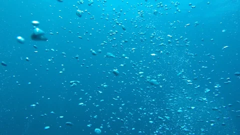 Air bubbles underwater Stock Footage 128910072