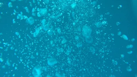 Air bubbles underwater Stock Footage 128910088