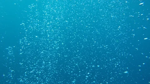 Air bubbles underwater Stock Footage 129641569
