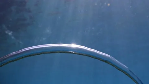 Air bubbles underwater ocean scenery for backround textures turning and rolling Stock Footage 175863471