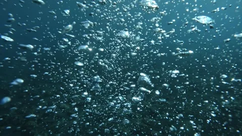 Air bubbles underwater, super slomo, diving oxygen, bubbles in the ocean Stock Footage 249985585