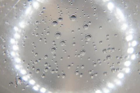 Air Bubbles in Water with Backlight Stock Photos