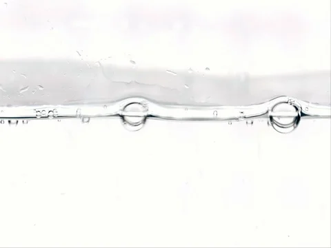 Air bubbles in water Stock Footage 80597074