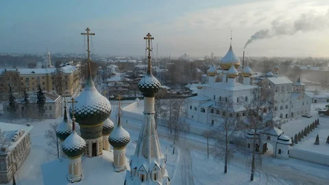 Air Camera panorama down along the church in winter Stock Footage 101078675