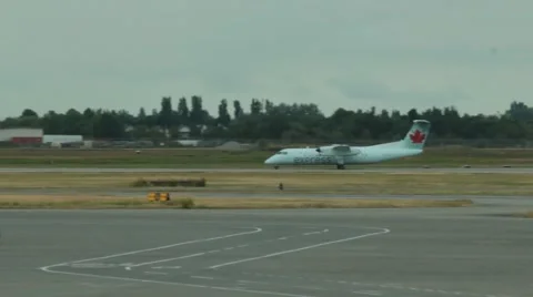 Air Canada Dash 8-300 Airplane Taxis to Terminal  Stock Footage 42114531