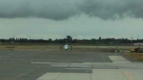 Air Canada Dash 8-300 Airplane Taxis on Tarmac Stock Footage 42114739