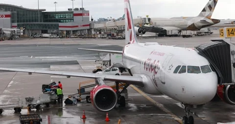 AIR CANADA Rouge Airplane preparing for boarding at Toronto Pearson Airport Video stock 327732564