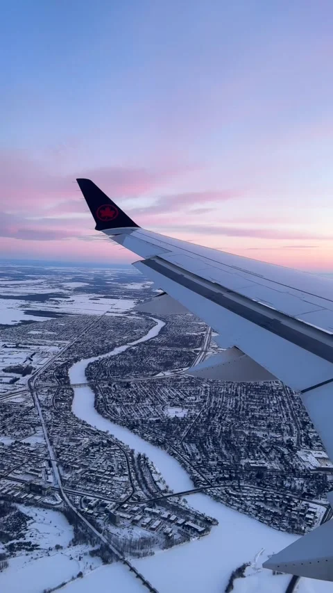 Air Canada wing during sunrise Stock Footage 329900993