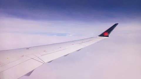 Air Canada Wing Over Clouds Stock Photos