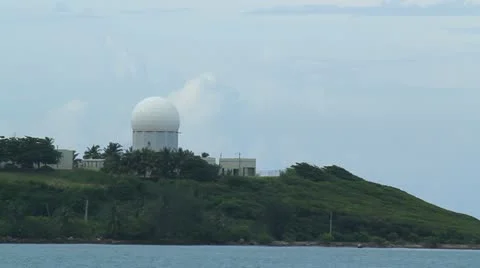 Air combat command radar dome in remote island Stock Footage 11900543