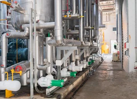 Air compressor pump in Chiller system In industrial plants Stock Photos