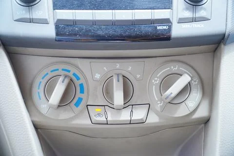 Air condition button inside a car, car interior. dirty Manual air condition.. Stock Photos