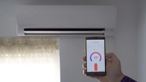 Air condition control through smartphone app Stock Footage 106135226