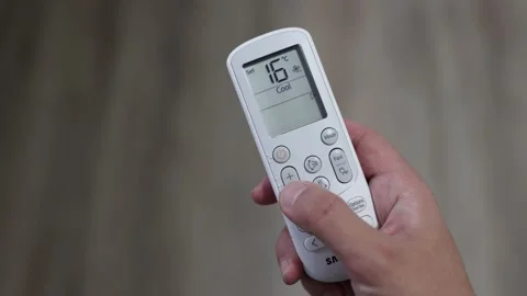 Air Conditioner Changing Temperature AC Remote Decreasing Room Temperature Video stock 201488355