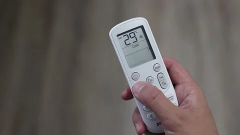Air Conditioner Changing Temperature AC Remote Increasing Room Temperature Stock Footage 201489483
