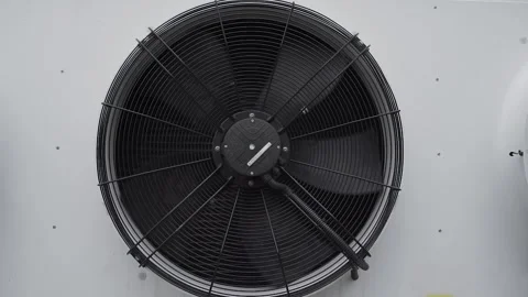 The air conditioner fan hangs on the wall and rotates Video stock 306148024