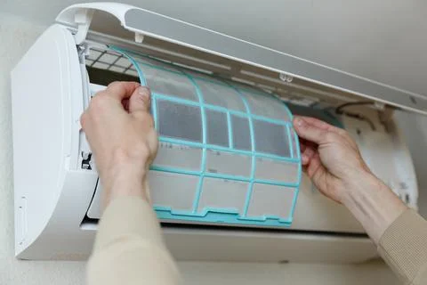 Air conditioner filter cleaning servise Stock Photos