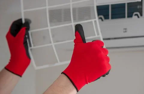 Air conditioner filter replacement, HVAC maintenance, clean air, ventilation Stock Photos