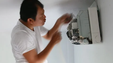 Air Conditioner maintenance cleaner Stock Footage 36680994