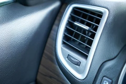 Air conditioner in modern car, note shallow depth of field. Stock Photos